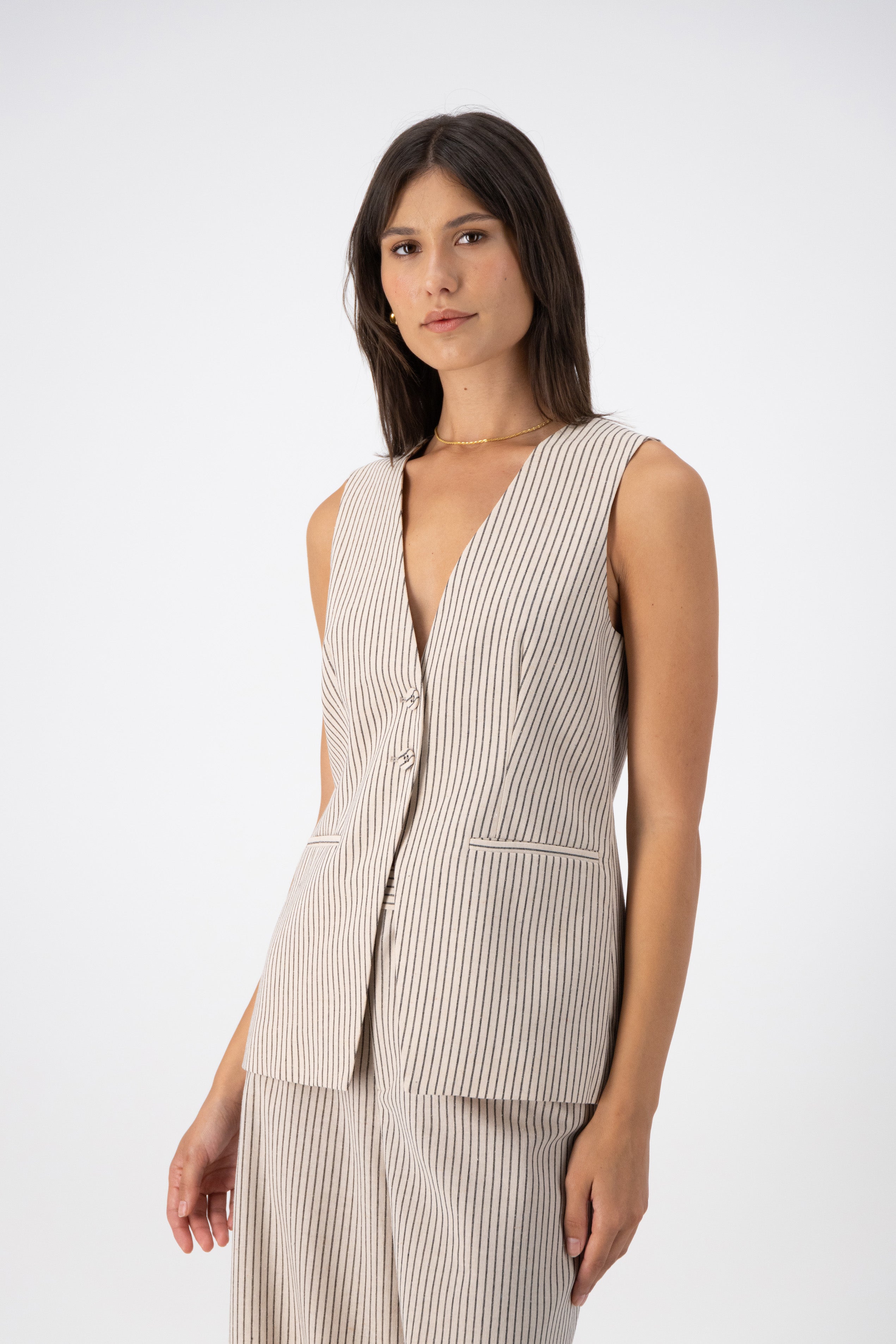 A woman is wearing Hayes Linen Stripe Vest.