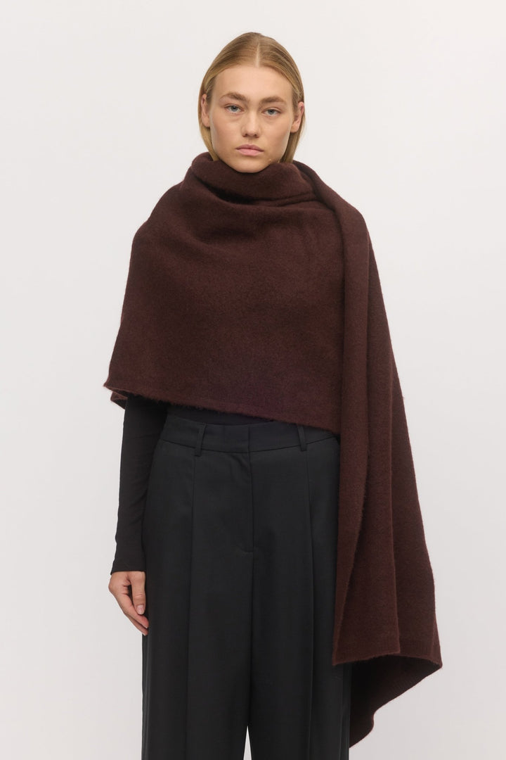 Woman wearing the Brushed Anywhere Wrap in Mahogany – front view of soft wool-cashmere wrap with rich brushed texture and warm drape.