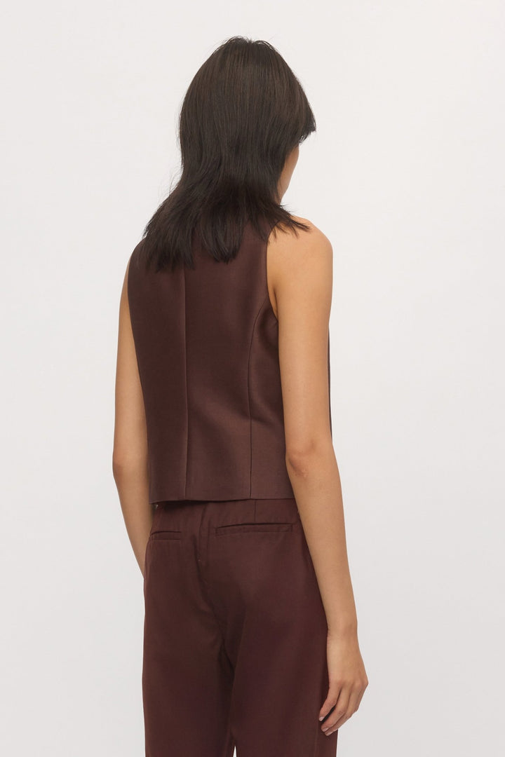 Close-up back view of tailored Button Down Vest – fine stitching and fabric detail highlighted.