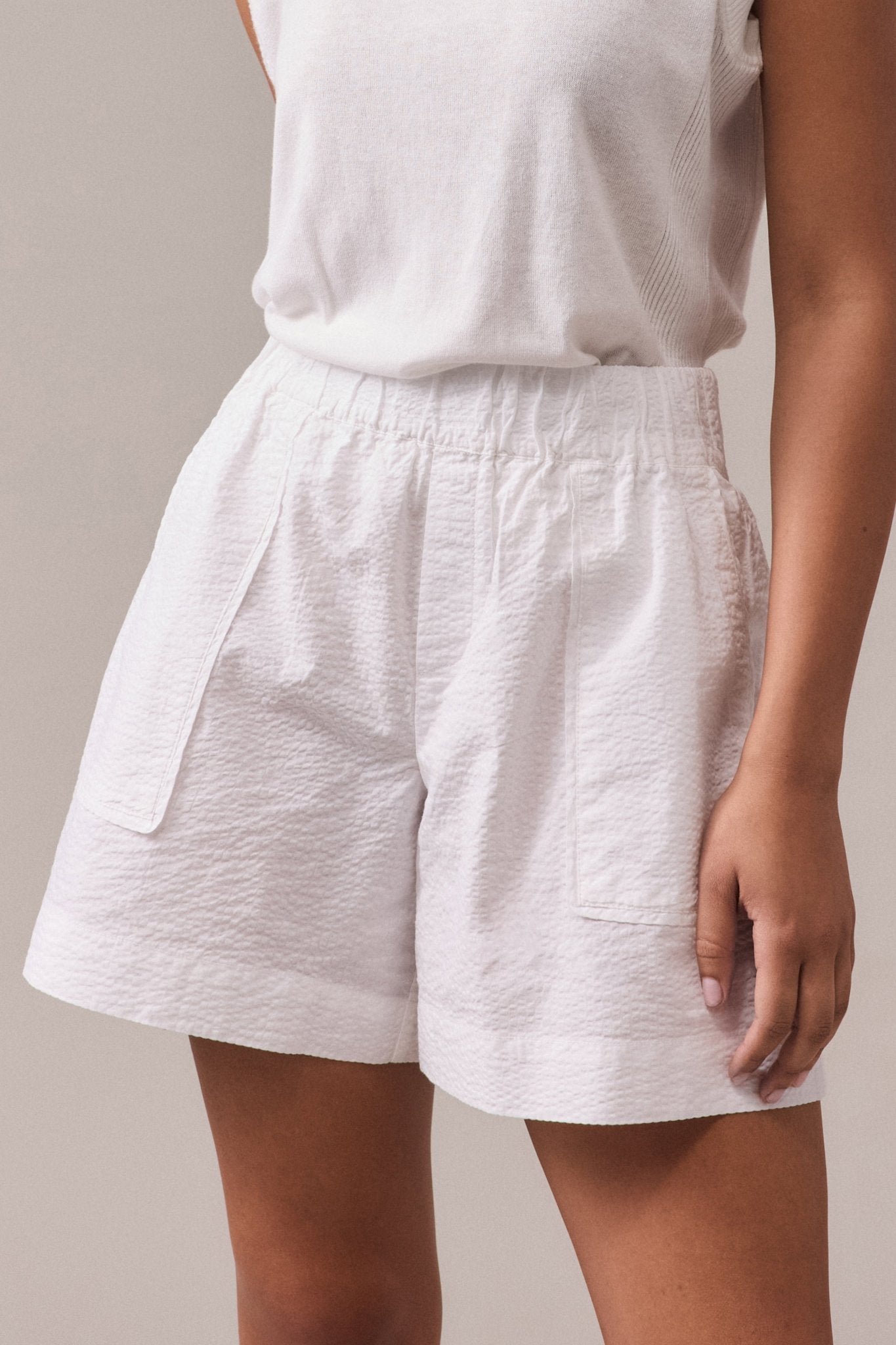 White Crawford textured cotton shorts.