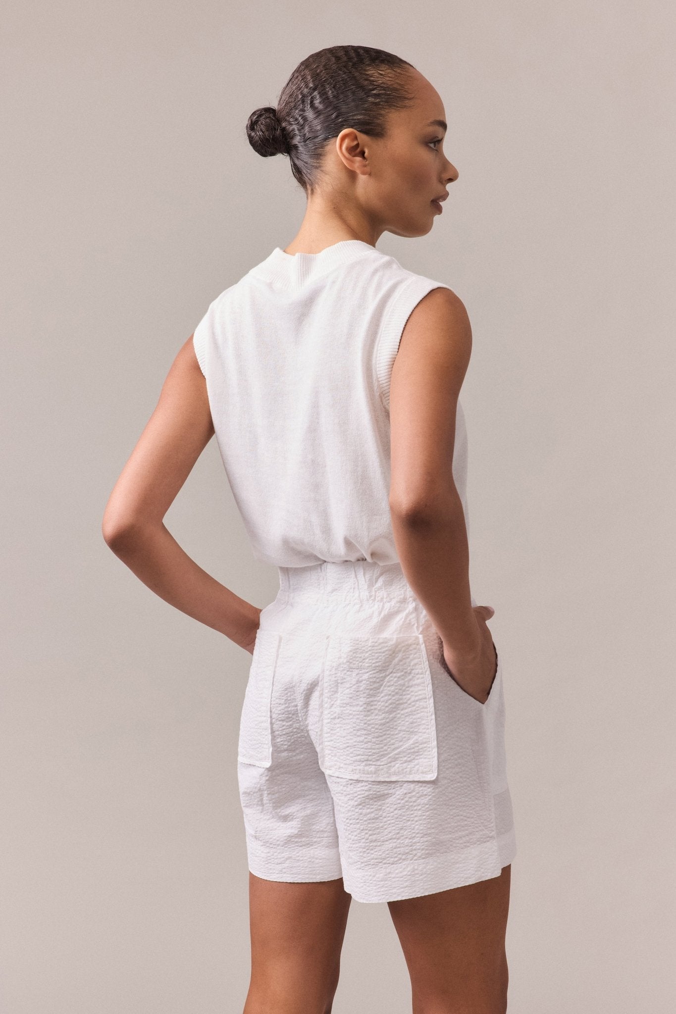 Back view of women's Crawford textured cotton shorts with back pockets.