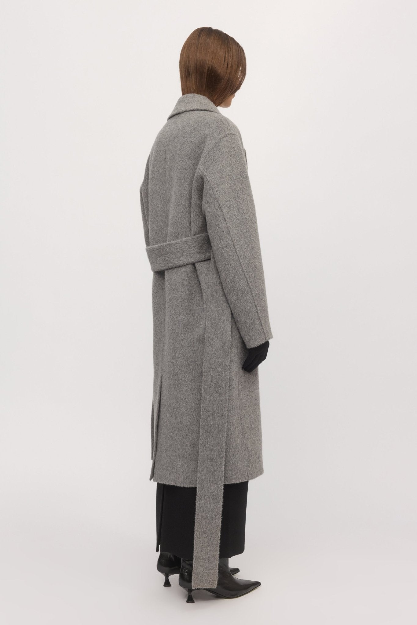 Back angle of metallic Drop Shoulder Coat highlighting cocoon shape and long waist tie โ Skin and Threads