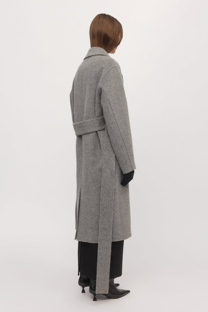 Back angle of metallic Drop Shoulder Coat highlighting cocoon shape and long waist tie โ Skin and Threads