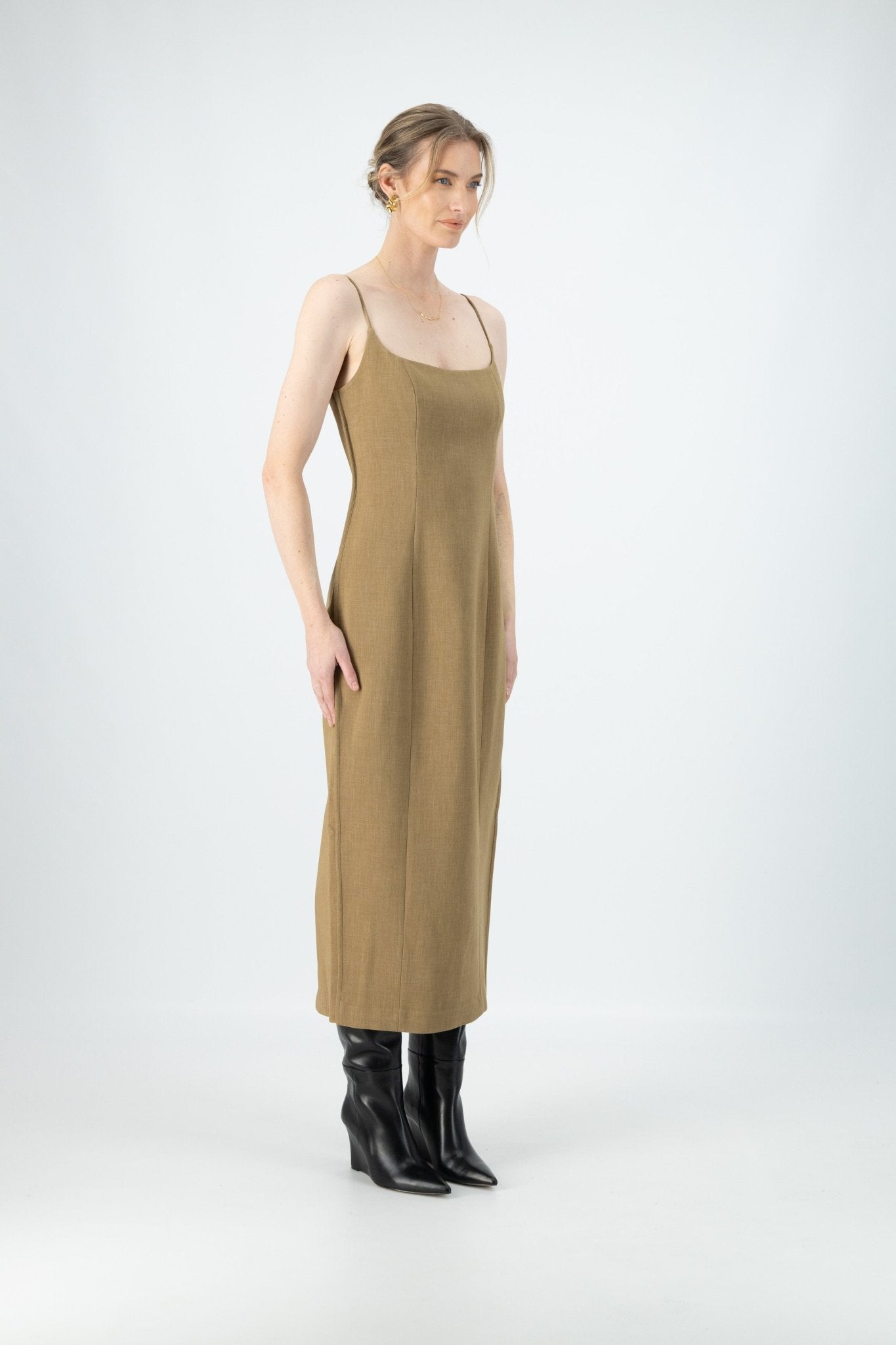 A side view of woman wearing Kiana Chantelle Dress.