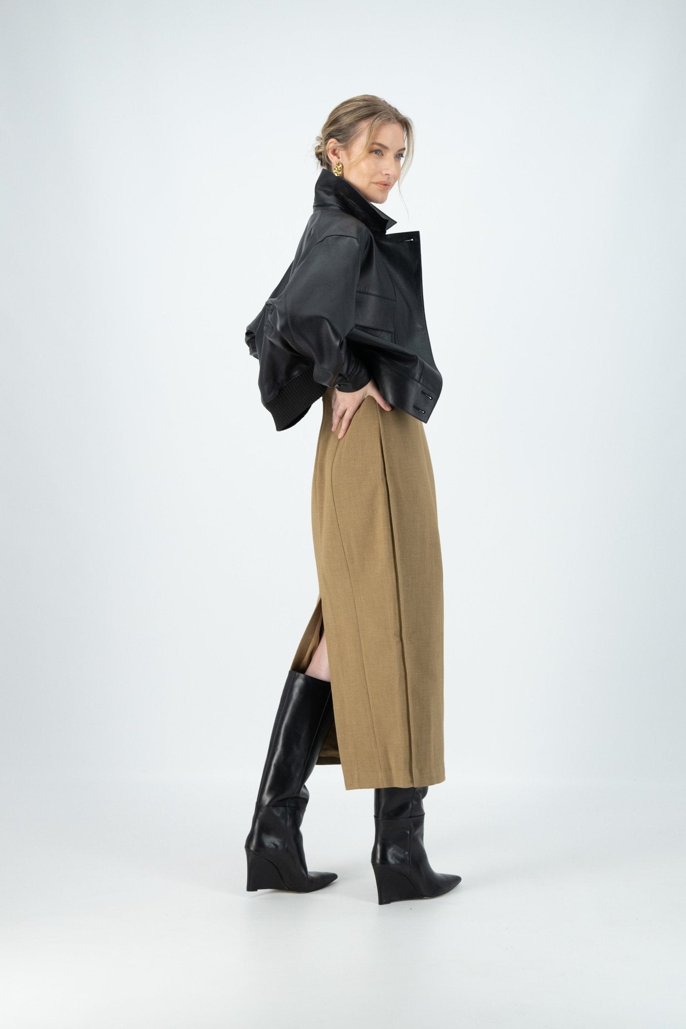 Kiana Dress paired with a black leather jacket and black leather boots.