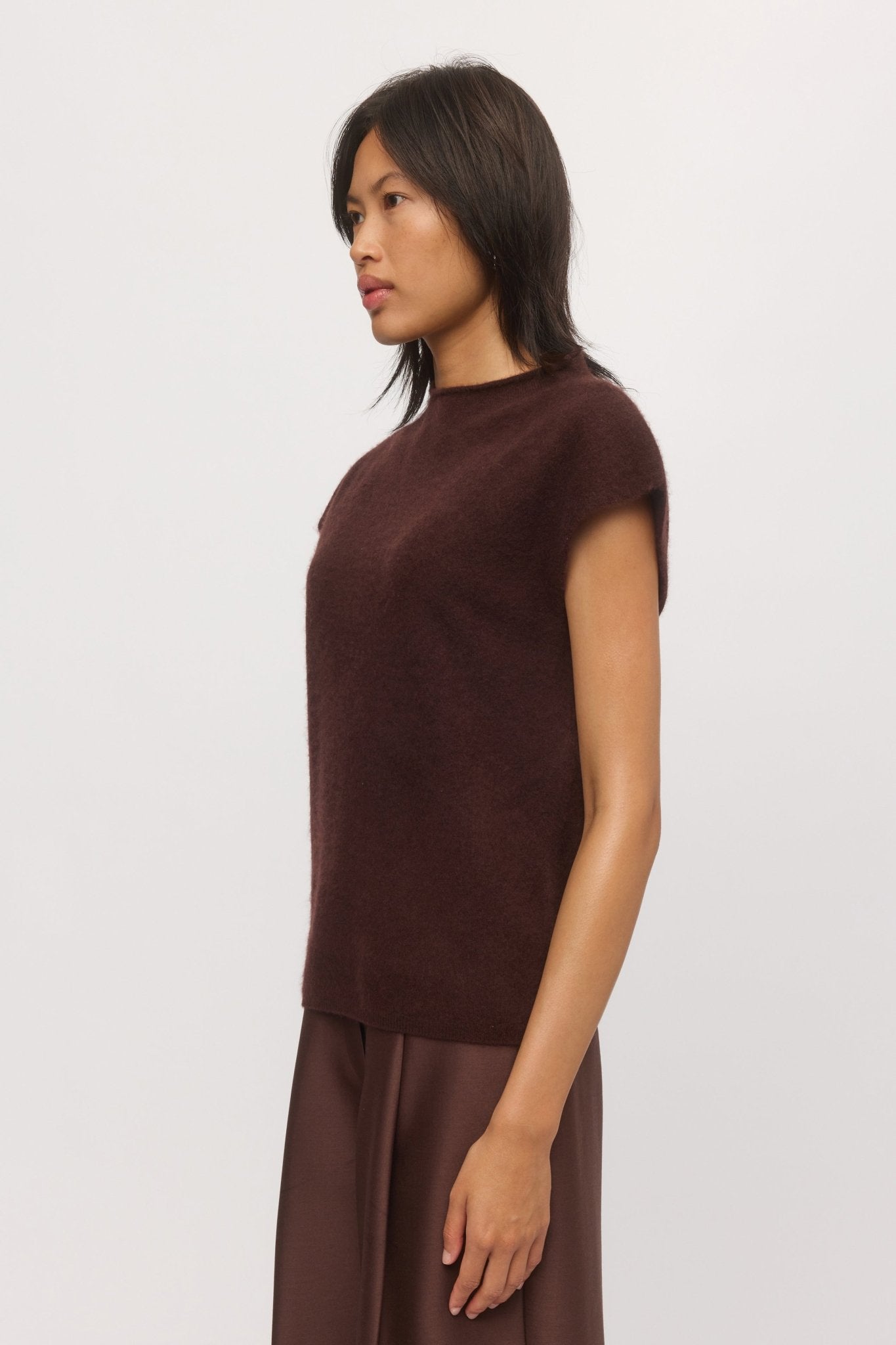 Side view of women's cashmere and wool knit tank in mahogany.