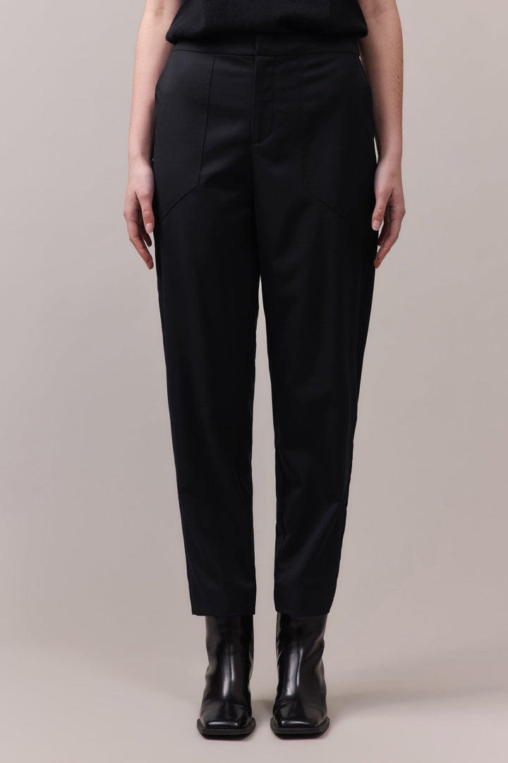 Front view of the black Marlow Casual Pant for women, designed with a sleek, tailored waistband and elastic back, made from soft, breathable wool.