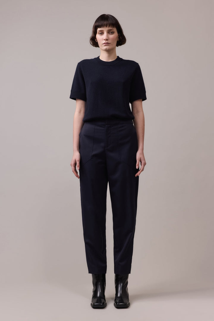 Full view of the navy Marlow Casual Pant for women, made from soft wool with a relaxed silhouette and thoughtful details.