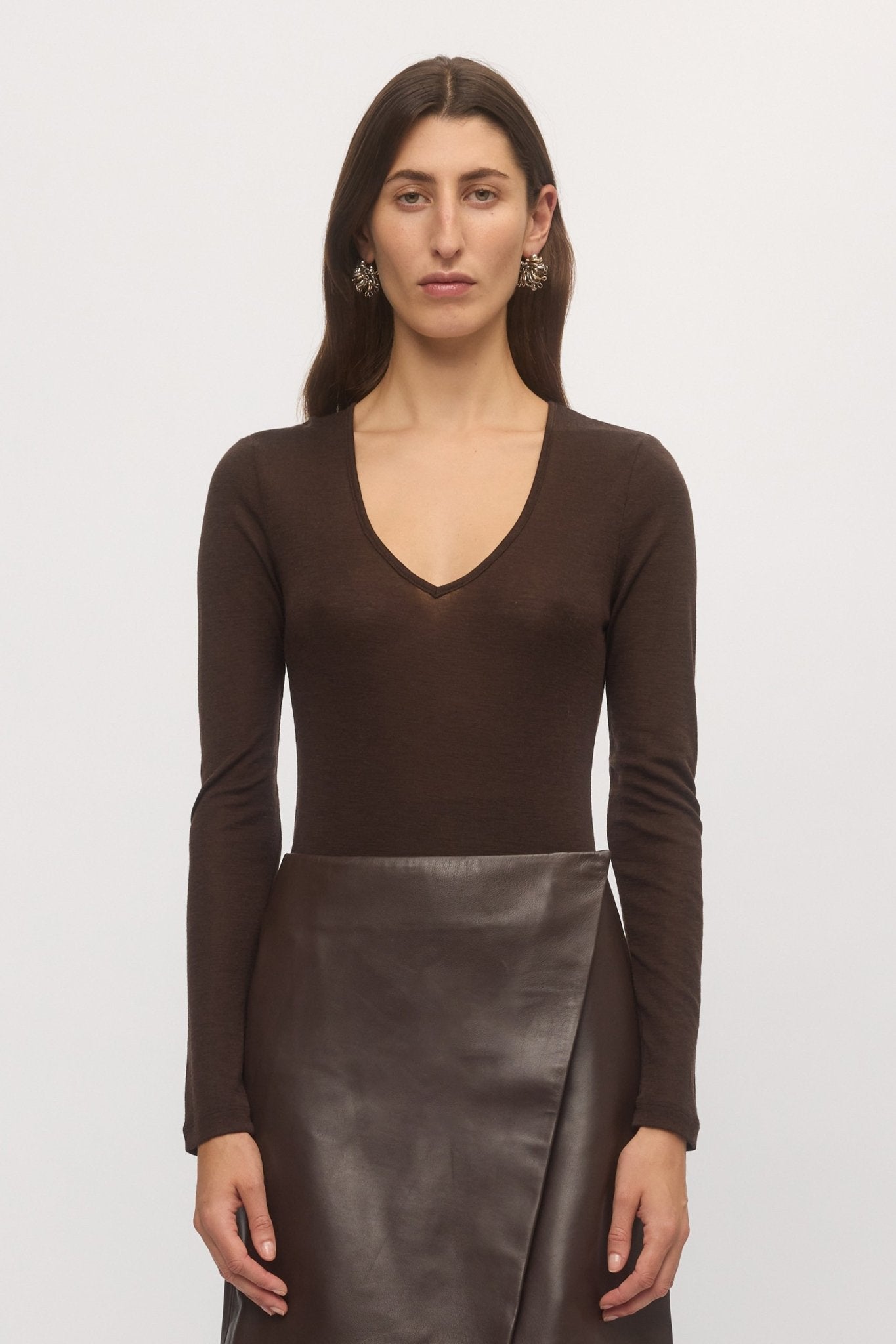 Front close-up of woman in Merino V sweater in mahogany – Skin and Threads