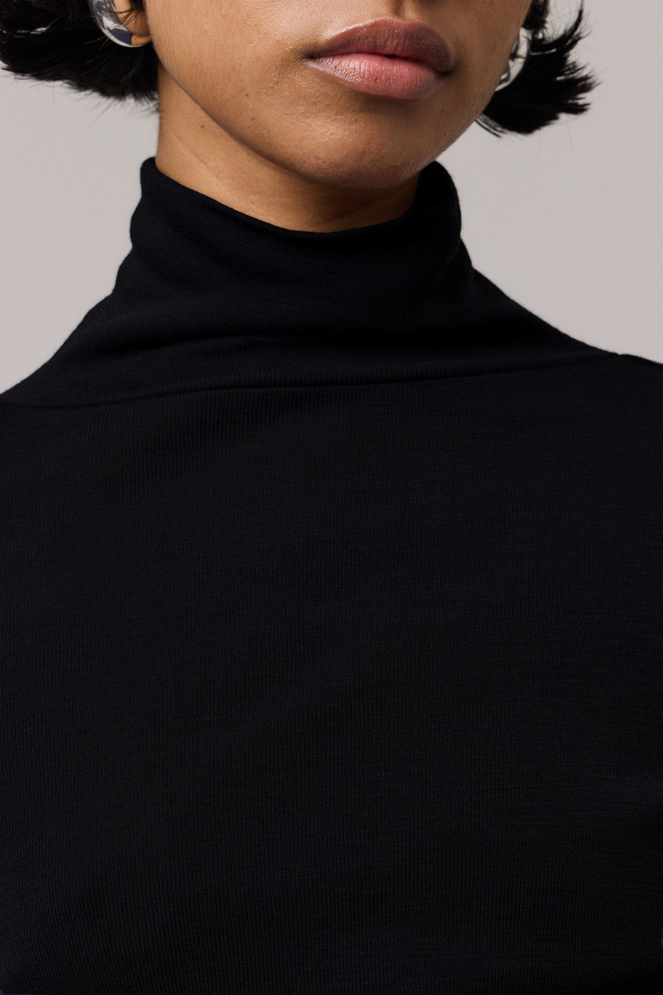 Black women's Merino Wool skivvy with a turtleneck.