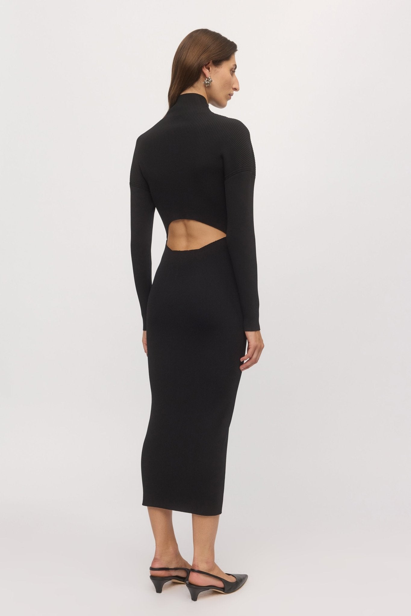 Back view of woman wearing Open Back Rib Dress showcasing open back cut-out and ribbed knit fit โ Skin and Threads