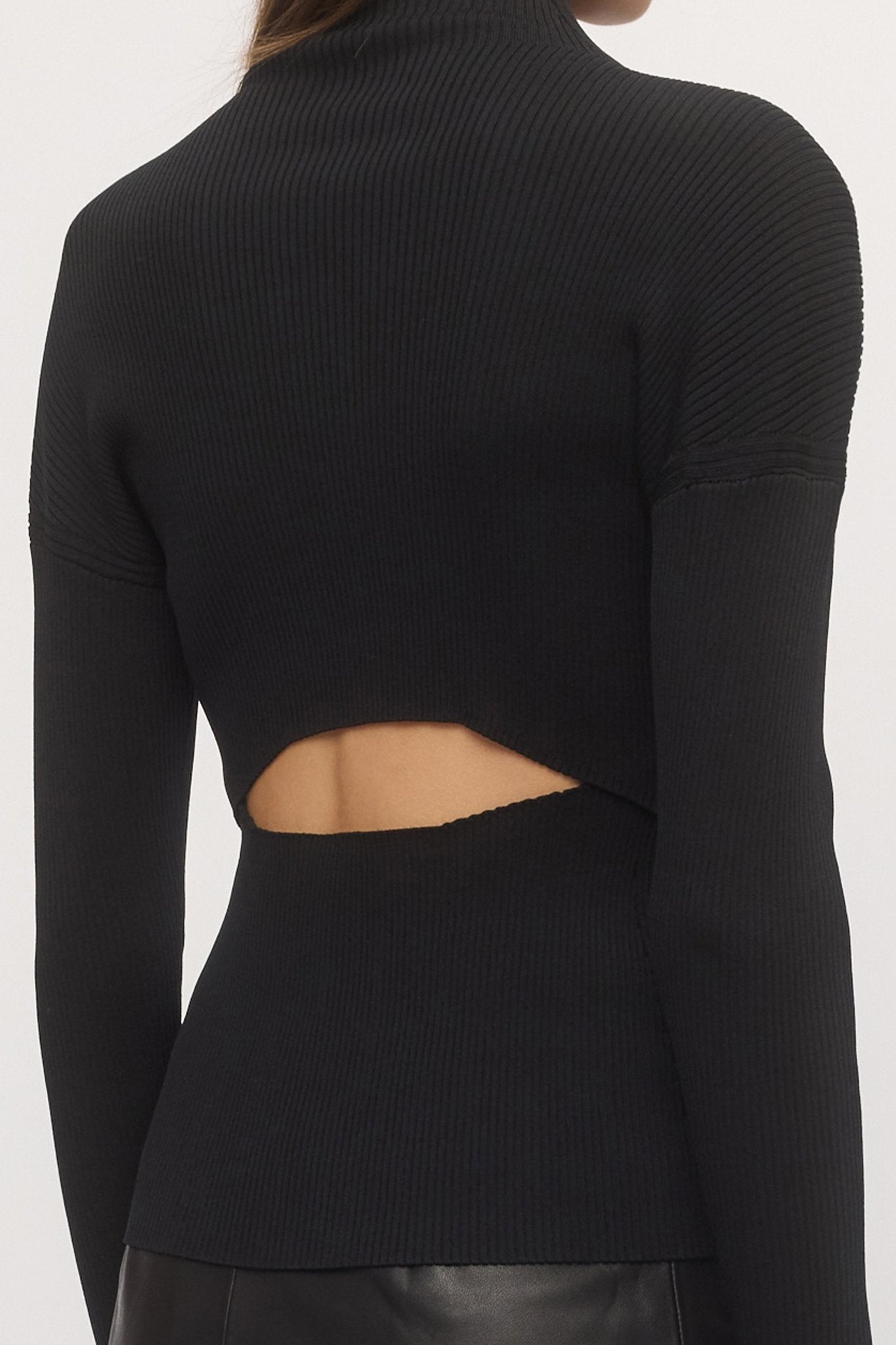 Close-up back view of Open Back Rib Top in black rib knit showing angular open cut-out and sculpted fit – Skin and Threads