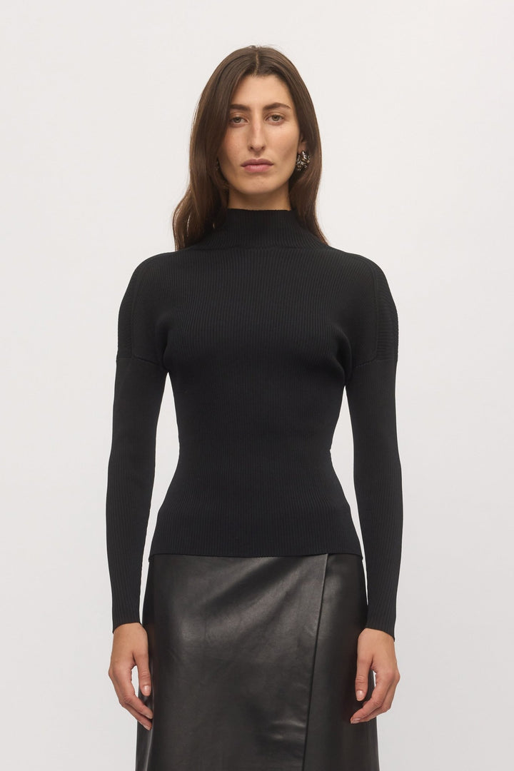 Front view of Open Back Rib Top with ribbed structure, mock neckline, and slim contoured fit – Skin and Threads