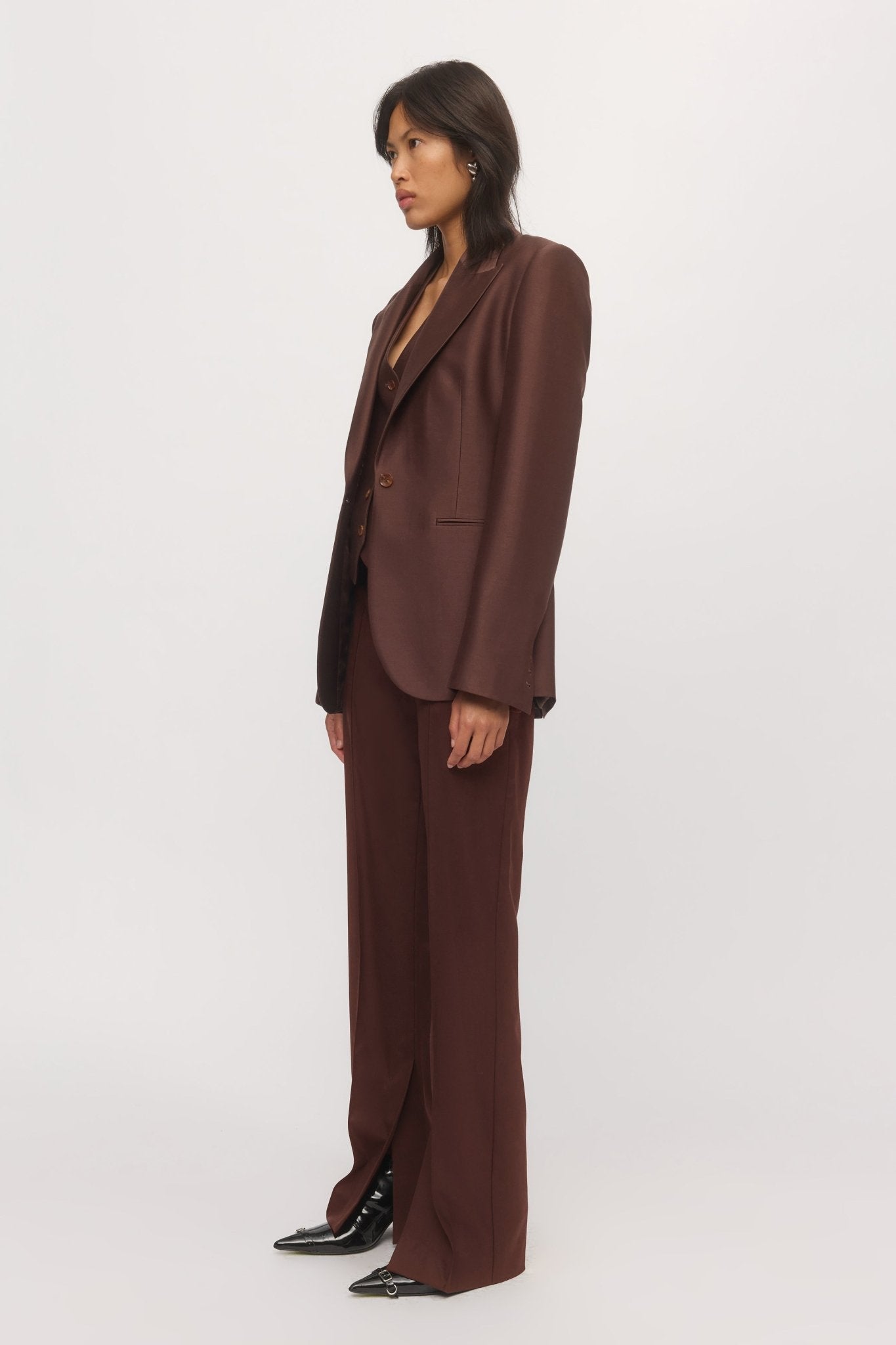 Side view of Single Button Blazer mahogany styled with tailored trousers โ Skin and Threads