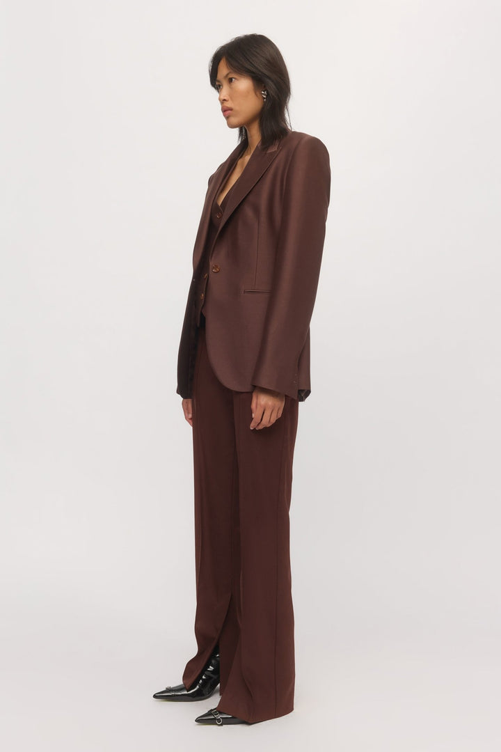Side view of Single Button Blazer mahogany styled with tailored trousers โ Skin and Threads