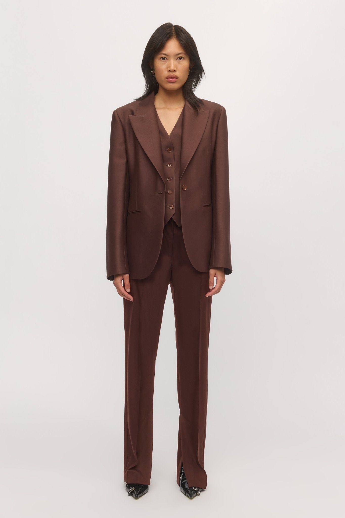 Front view of woman wearing Single Button Blazer in mahogany wool with matching trousers and vest โ Skin and Threads