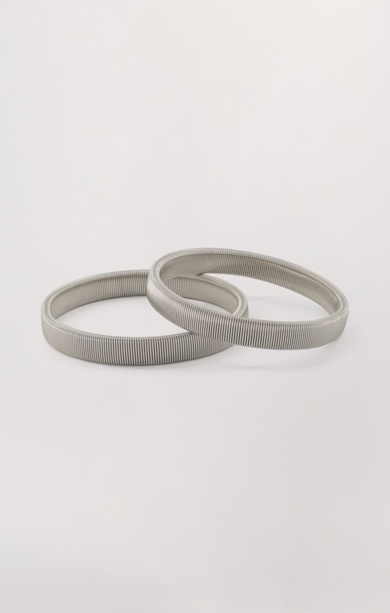 Silver sleeve garter for women.