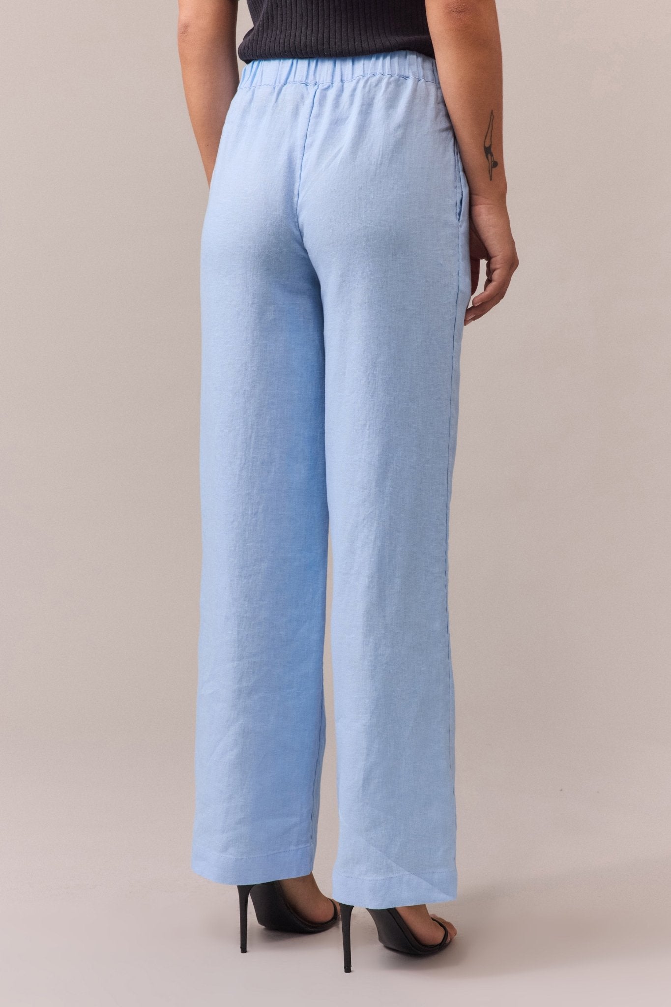 women's blue linen wide leg pant from back