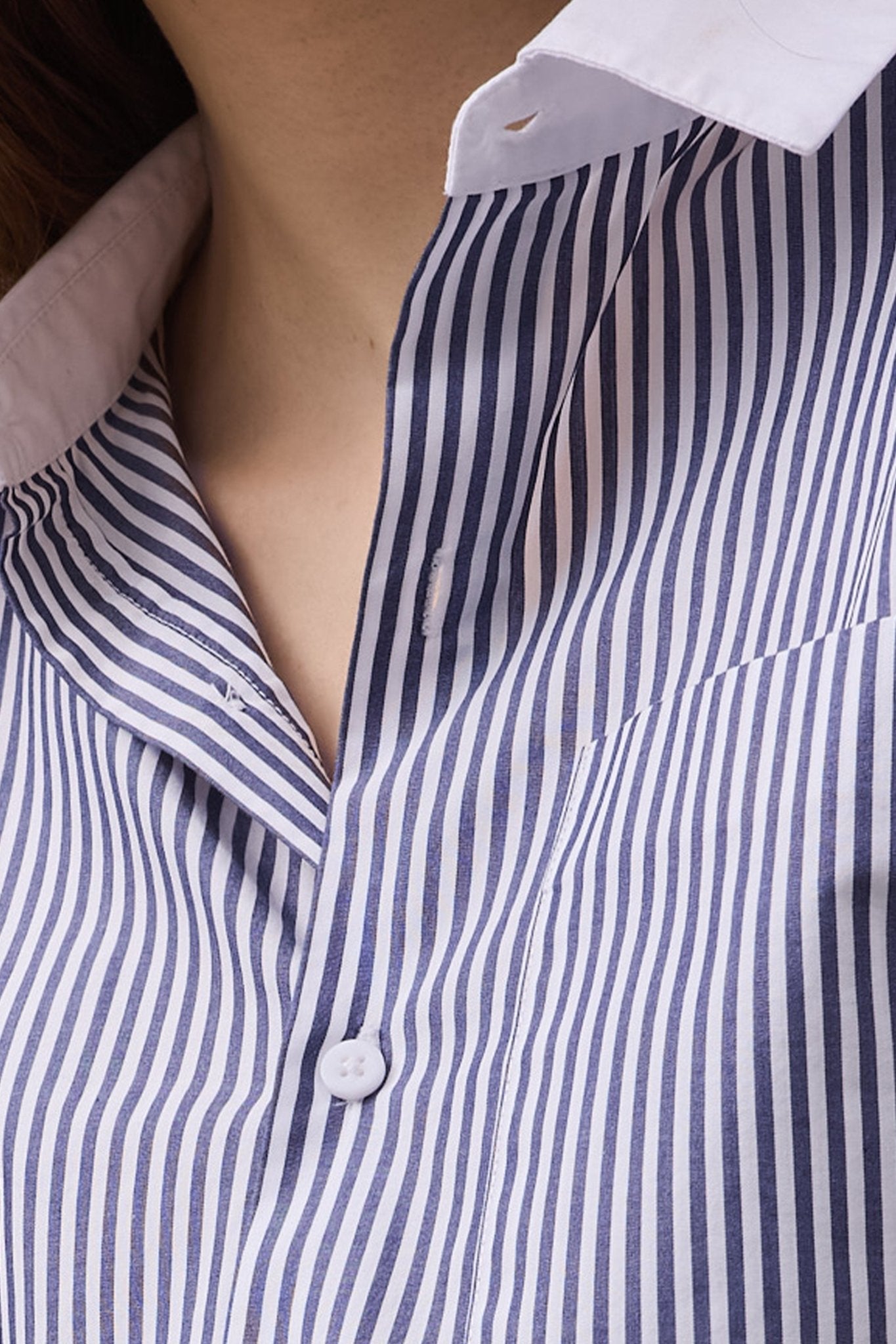 Close-up of the Lenny Stripe Shirt, highlighting the navy and white striped pattern and the crisp white contrast collar.