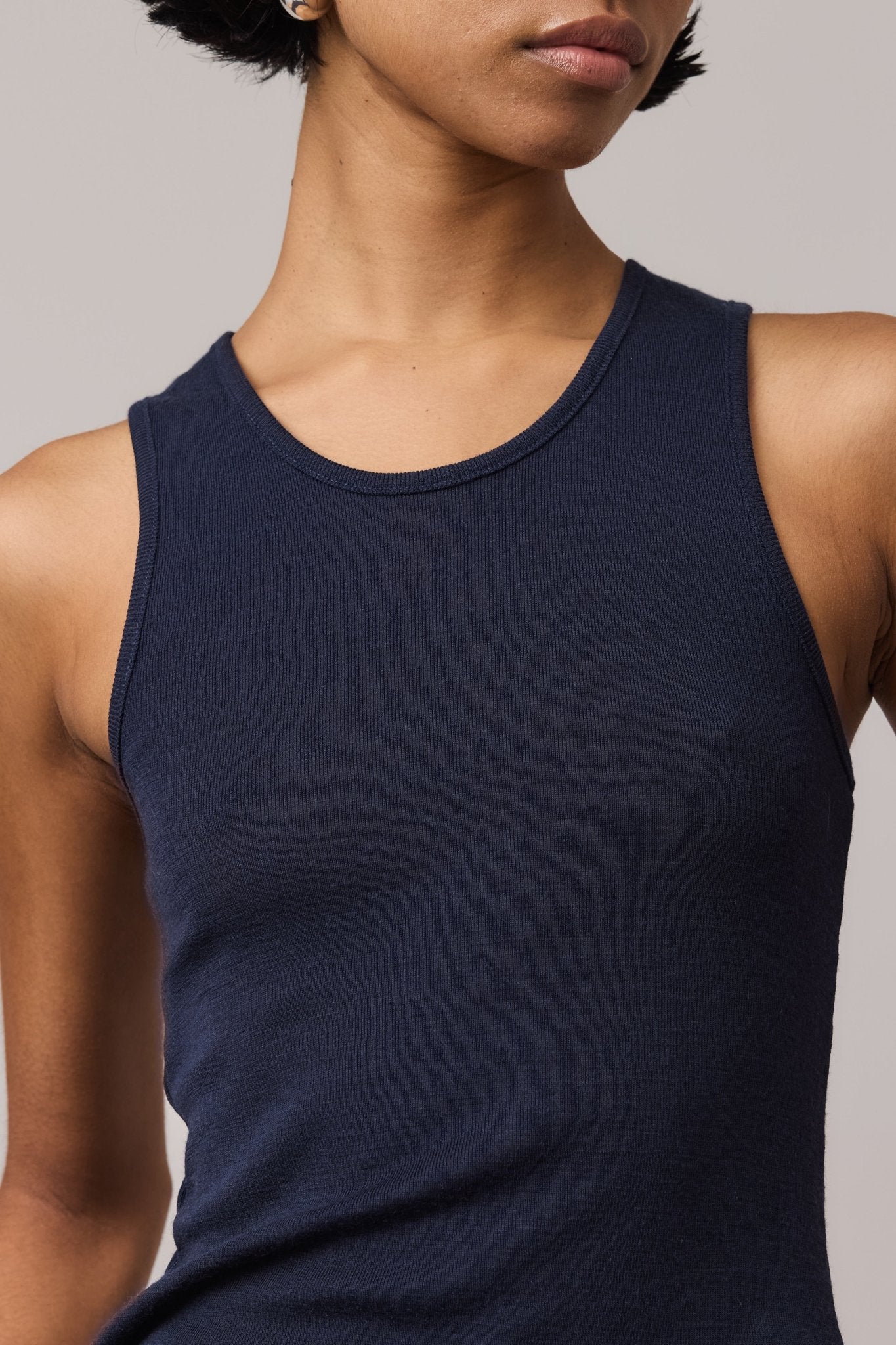 Close-up of an indigo women's Merino Wool Tank Top.